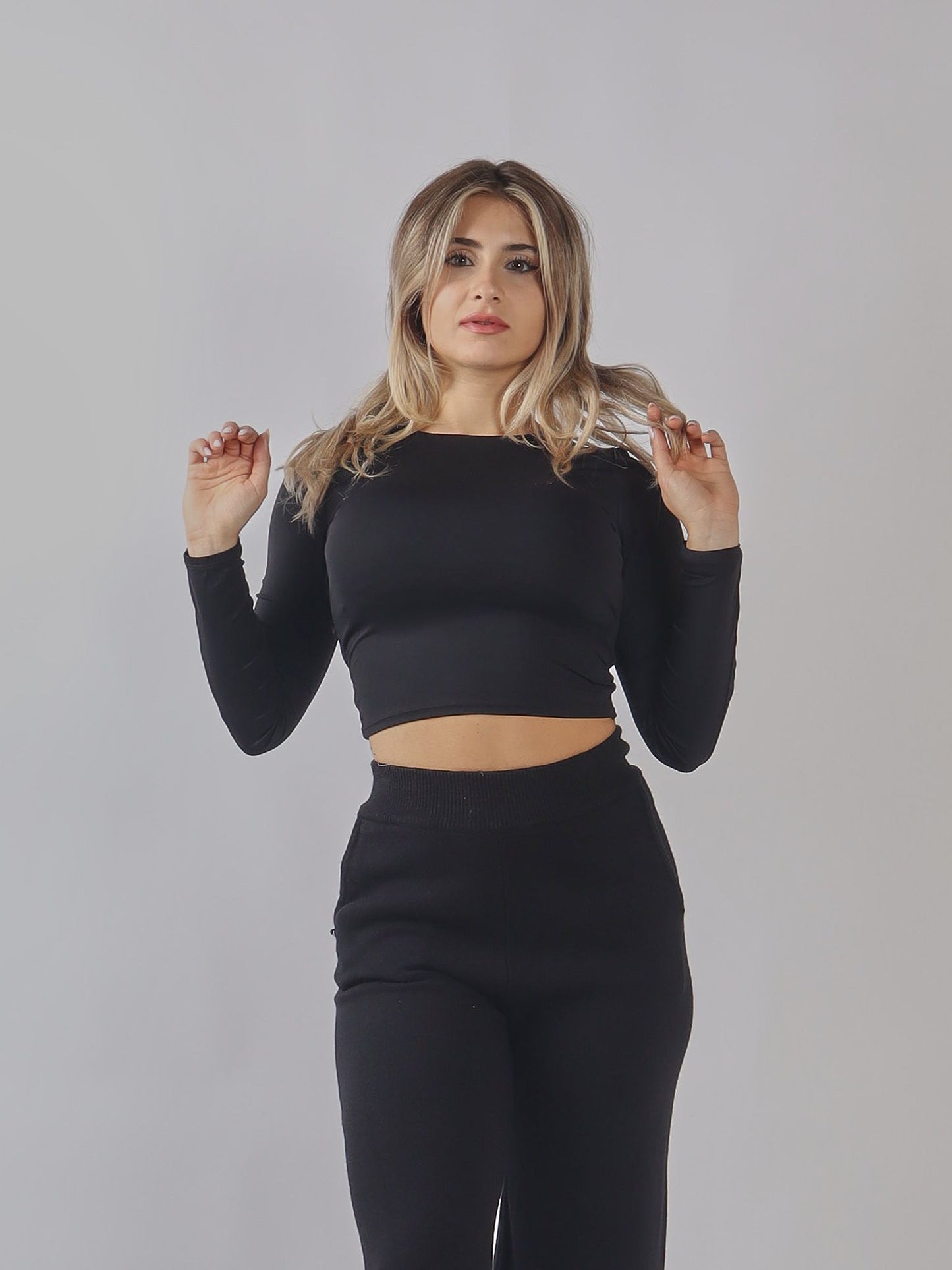 Top a manica lunga con schiena scoperta