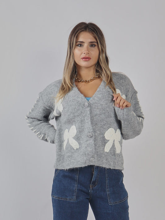 CARDIGAN CON FIOCCHI