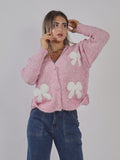 CARDIGAN CON FIOCCHI