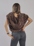 GILET IN ECO-PELLICCIA CON CAPPUCCIO