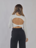 Top a manica lunga con schiena scoperta