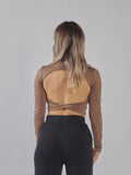 Top a manica lunga con schiena scoperta