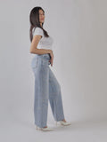 JEANS A GAMBA LARGA CON STRASS