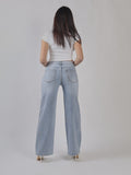 JEANS A GAMBA LARGA CON STRASS