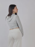 FELPA CROP CON CAPUCCIO PE 25