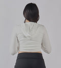 FELPA CROP CON CAPUCCIO PE 25