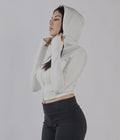 FELPA CROP CON CAPUCCIO PE 25