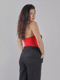 TOP STRAPLESS CON CUT-OUT E PANTALONI A VITA ALTA