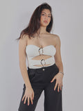 TOP STRAPLESS CON CUT-OUT E PANTALONI A VITA ALTA