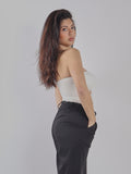 TOP STRAPLESS CON CUT-OUT E PANTALONI A VITA ALTA